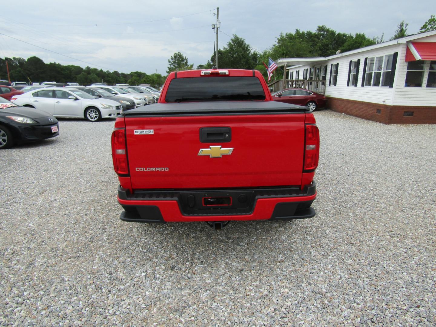 2017 Red /Gray Chevrolet Colorado Work Truck Ext. Cab 2WD (1GCHSBEA0H1) with an 2.5L L4 DOHC 16V GAS engine, 6A transmission, located at 15016 S Hwy 231, Midland City, AL, 36350, (334) 983-3001, 31.306210, -85.495277 - Photo#6